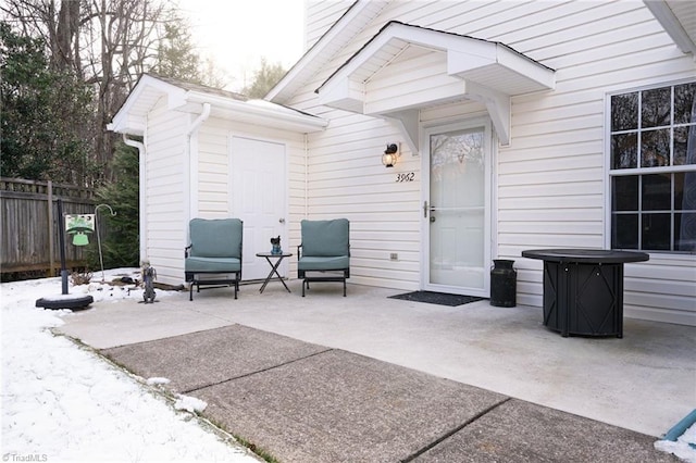 doorway to property featuring a patio area