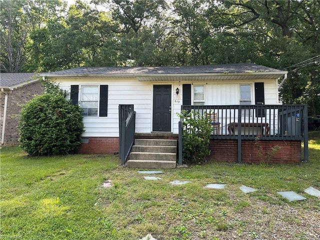 619 Spring Garden Cir, High Point, NC 27260 - bungalow-style house featuring a front lawn