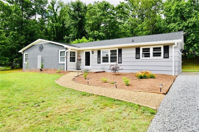 2025 Pope Rd, Winston-Salem, NC 27127 - ranch-style house featuring a front lawn and view of scattered trees