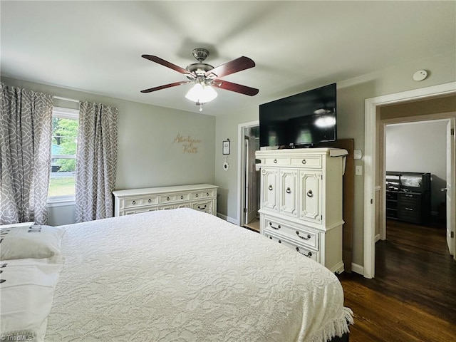 2025 Pope Rd, Winston-Salem, NC 27127 - bedroom with dark wood-style floors, baseboards, and ceiling fan