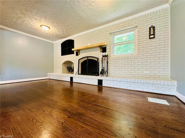 2025 Pope Rd, Winston-Salem, NC 27127 - unfurnished living room with a textured ceiling, wood finished floors, crown molding, a fireplace, and baseboards
