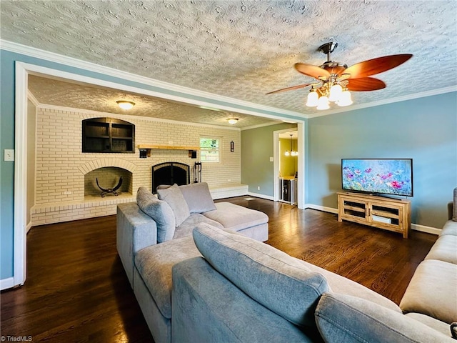 2025 Pope Rd, Winston-Salem, NC 27127 - living area with baseboards, wood finished floors, a ceiling fan, a brick fireplace, and crown molding