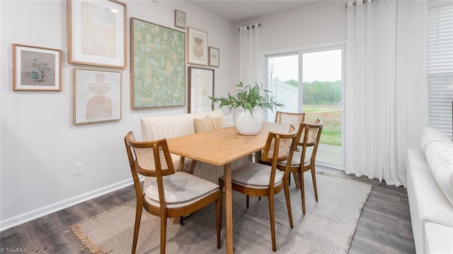 1436 Amberview Ln, Kernersville, NC 27284 - dining area featuring dark wood-type flooring and baseboards