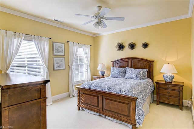 bedroom featuring light colored carpet, crown molding, and ceiling fan