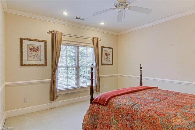 bedroom featuring ornamental molding, carpet flooring, and ceiling fan