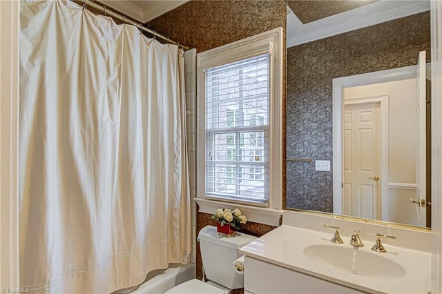 full bathroom with crown molding, toilet, vanity, and plenty of natural light