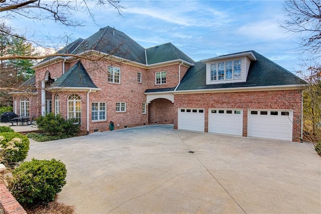 view of front of property with a garage