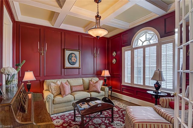 living room featuring beamed ceiling, coffered ceiling, and crown molding