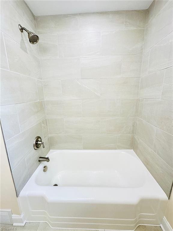 5670 Plantation Dr, Winston-Salem, NC 27105 - bathroom featuring tub / shower combination and baseboards