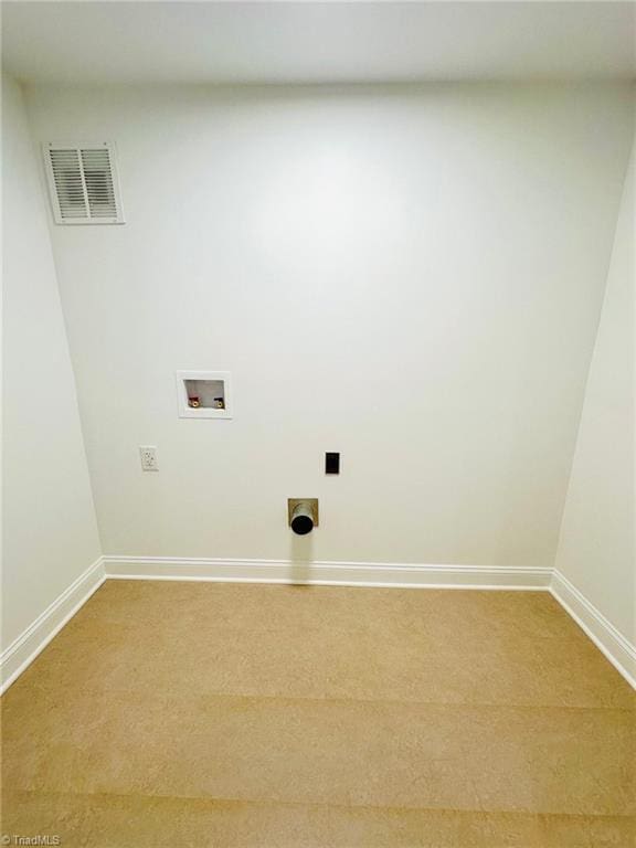 5670 Plantation Dr, Winston-Salem, NC 27105 - laundry room with hookup for a washing machine, light colored carpet, baseboards, and hookup for an electric dryer
