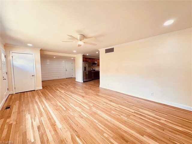 5670 Plantation Dr, Winston-Salem, NC 27105 - unfurnished living room featuring ornamental molding, light wood-type flooring, ceiling fan, baseboards, and recessed lighting