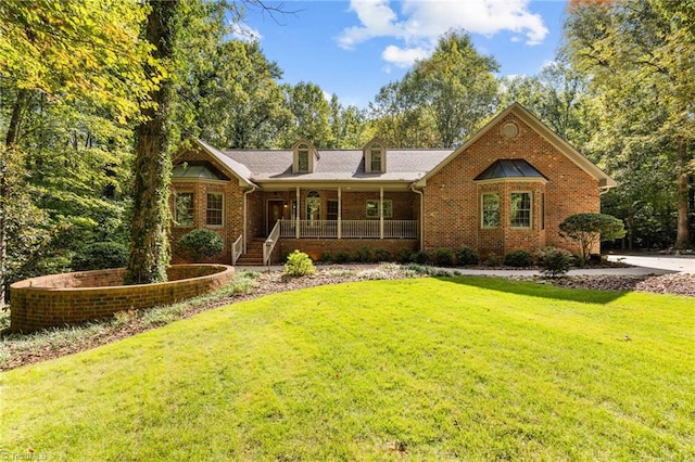 ranch-style house with a front yard and a porch