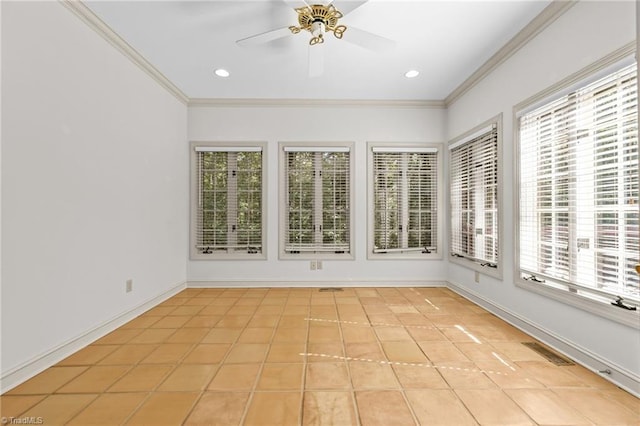 unfurnished sunroom with ceiling fan and plenty of natural light