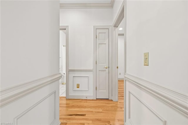 corridor with light wood-type flooring