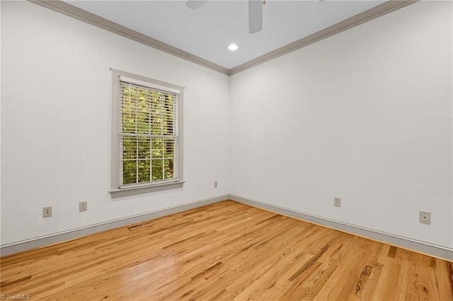 unfurnished room with crown molding, hardwood / wood-style flooring, and ceiling fan