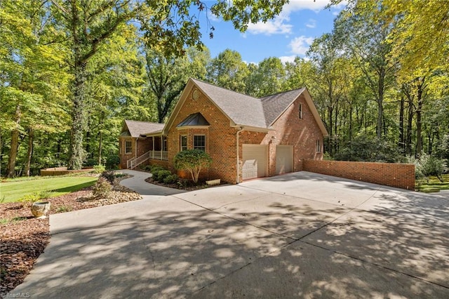 view of side of home with a porch