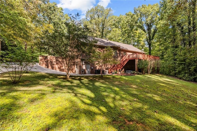 view of yard with a deck