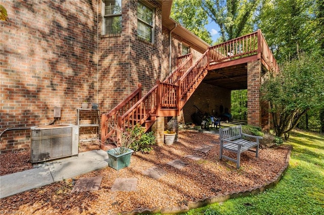 view of patio with a wooden deck and cooling unit