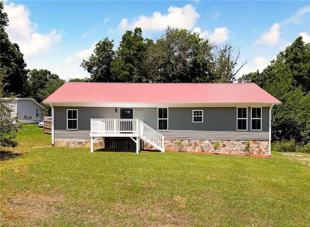 6376 Welborn Rd, Trinity, NC 27370 - view of front of property with a deck, a front yard, and a metal roof
