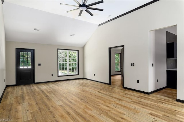 6376 Welborn Rd, Trinity, NC 27370 - unfurnished living room with light wood-style floors, ceiling fan, and lofted ceiling