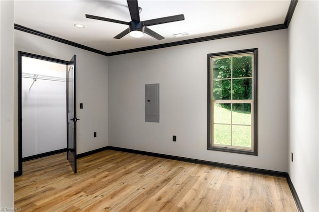 6376 Welborn Rd, Trinity, NC 27370 - unfurnished room with ornamental molding, electric panel, light wood finished floors, a ceiling fan, and recessed lighting
