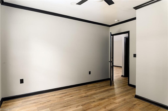 6376 Welborn Rd, Trinity, NC 27370 - unfurnished room featuring crown molding, light wood finished floors, and a ceiling fan