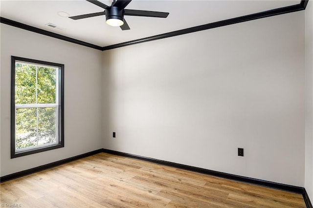 6376 Welborn Rd, Trinity, NC 27370 - spare room featuring ornamental molding, light wood finished floors, and a ceiling fan