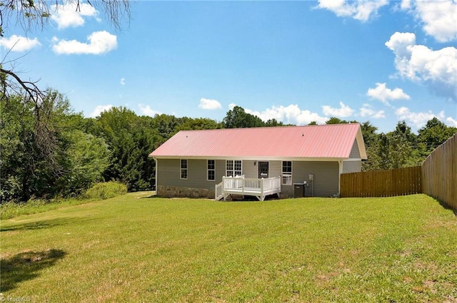 6376 Welborn Rd, Trinity, NC 27370 - rear view of property featuring a metal roof and a wooden deck