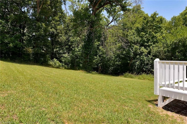 6376 Welborn Rd, Trinity, NC 27370 - view of grassy yard with a deck
