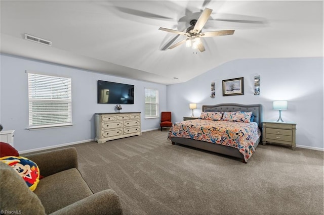 carpeted bedroom featuring lofted ceiling, ceiling fan, visible vents, and baseboards