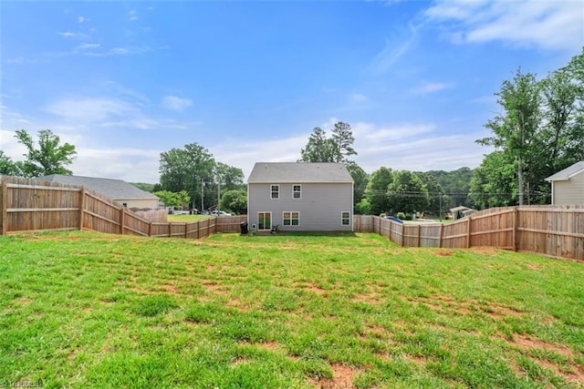 view of yard featuring a fenced backyard