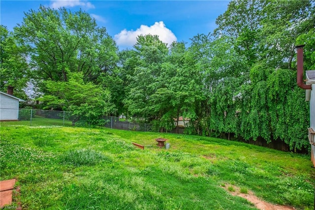 view of yard with fence