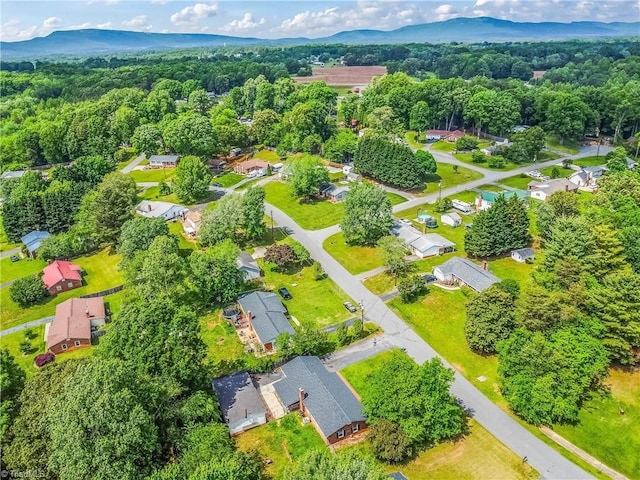 birds eye view of property with a residential view and a mountain view