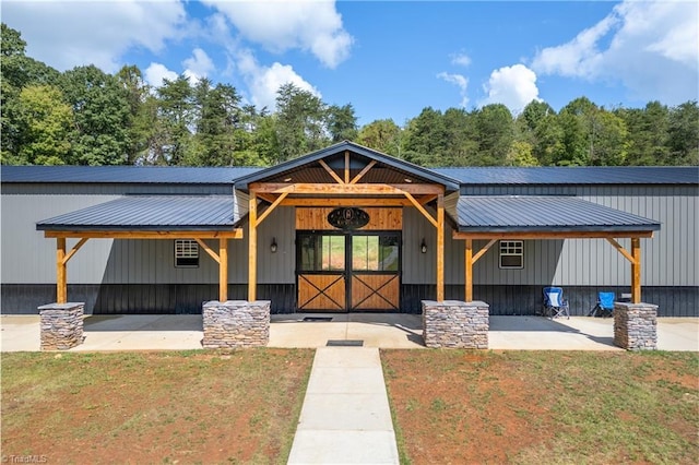 3289 Tobaccoville Rd, Tobaccoville, NC 27050 - view of front of house with metal roof