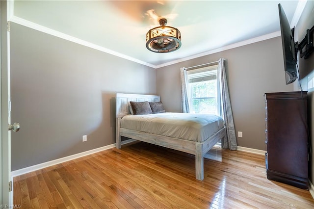 3289 Tobaccoville Rd, Tobaccoville, NC 27050 - bedroom featuring crown molding, baseboards, and light wood-style floors
