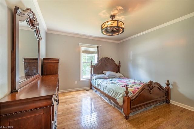 3289 Tobaccoville Rd, Tobaccoville, NC 27050 - bedroom with light wood-style flooring, baseboards, and crown molding