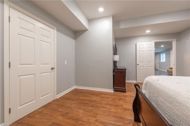 3289 Tobaccoville Rd, Tobaccoville, NC 27050 - bedroom with light wood finished floors, baseboards, and recessed lighting