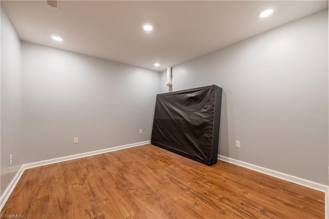 3289 Tobaccoville Rd, Tobaccoville, NC 27050 - empty room with baseboards, recessed lighting, and wood finished floors