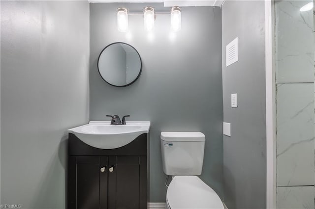3289 Tobaccoville Rd, Tobaccoville, NC 27050 - bathroom with vanity and toilet