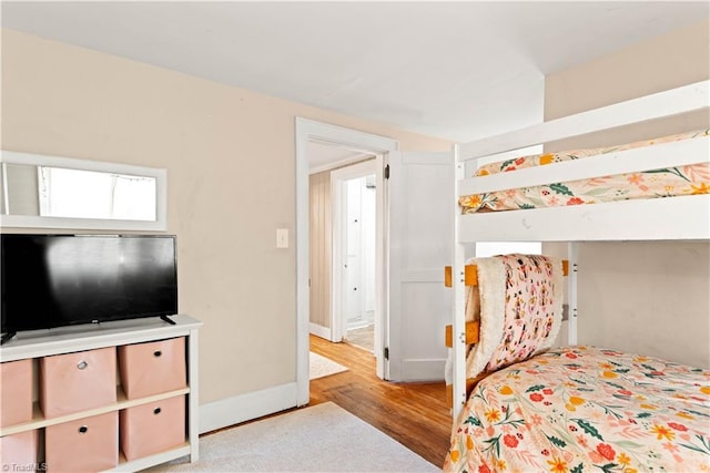 bedroom with light wood-type flooring