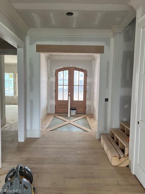 7920 Valley View Dr, Clemmons, NC 27012 - entryway with french doors, light wood-style flooring, and baseboards