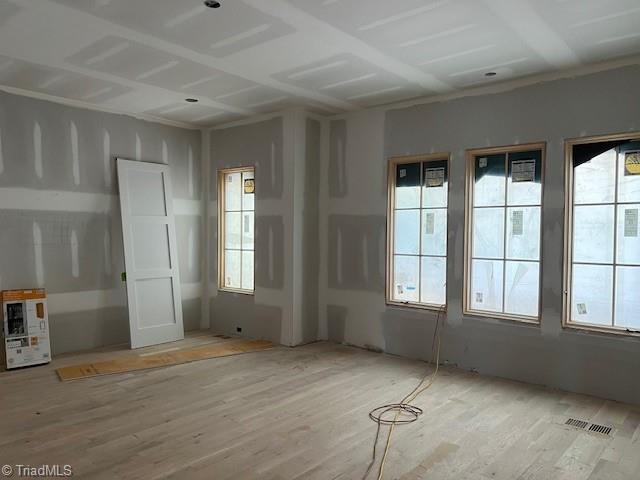 7920 Valley View Dr, Clemmons, NC 27012 - unfurnished room with plenty of natural light and wood finished floors