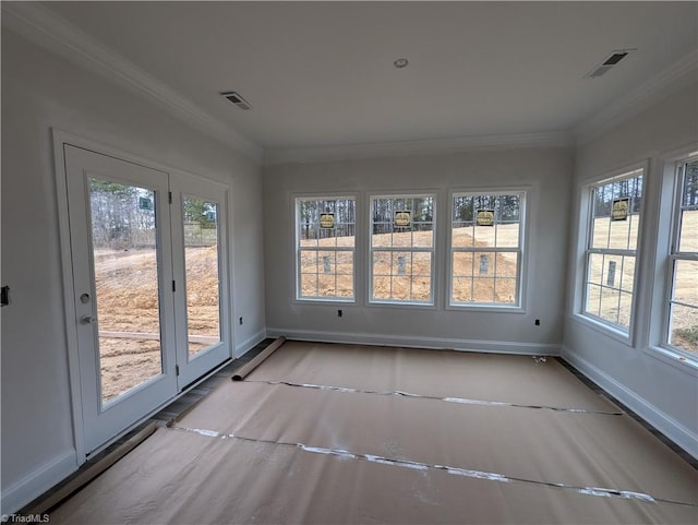 unfurnished sunroom with visible vents