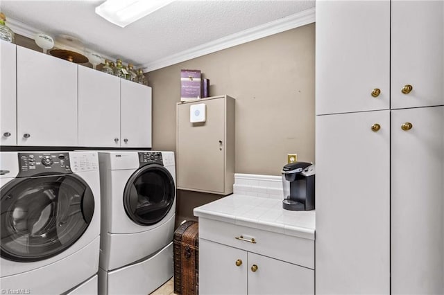 422 Wildwood Dr, Salisbury, NC 28146 - laundry area with separate washer and dryer, a textured ceiling, crown molding, and cabinet space