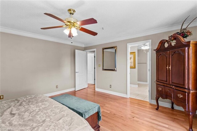 422 Wildwood Dr, Salisbury, NC 28146 - bedroom with ceiling fan, light wood-type flooring, baseboards, and ornamental molding