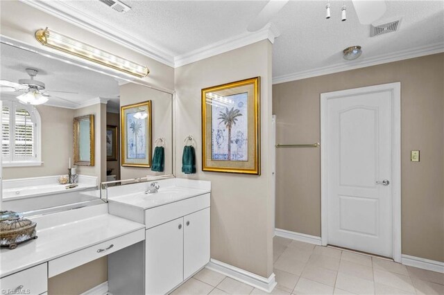 422 Wildwood Dr, Salisbury, NC 28146 - bathroom featuring a textured ceiling, vanity, ceiling fan, baseboards, and visible vents