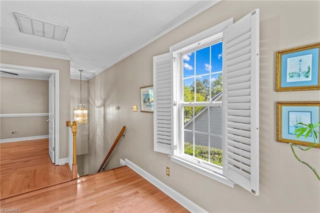 422 Wildwood Dr, Salisbury, NC 28146 - interior space with baseboards, ornamental molding, wood finished floors, and visible vents