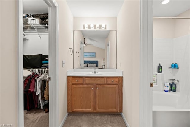 bathroom featuring vanity and bathing tub / shower combination