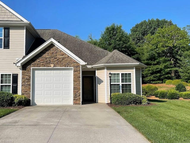 1684 Preston Woods Dr, Winston-Salem, NC 27127 - view of front of house with stone siding, a garage, concrete driveway, a front lawn, and a shingled roof