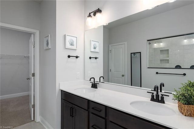 bathroom featuring dual vanity